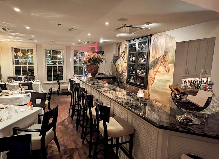 Dine and drink among a lively throng near the bar